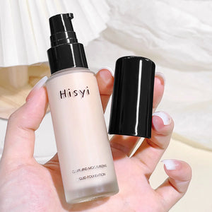 Hisy cream foundation in a hand, showcasing its clear, moisturizing liquid texture for full coverage and long-lasting wear.