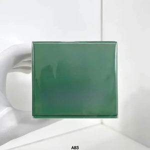 NoEnName_Null moisturizing cream 60ml/100ml packaging in a sleek green box held with a gloved hand.