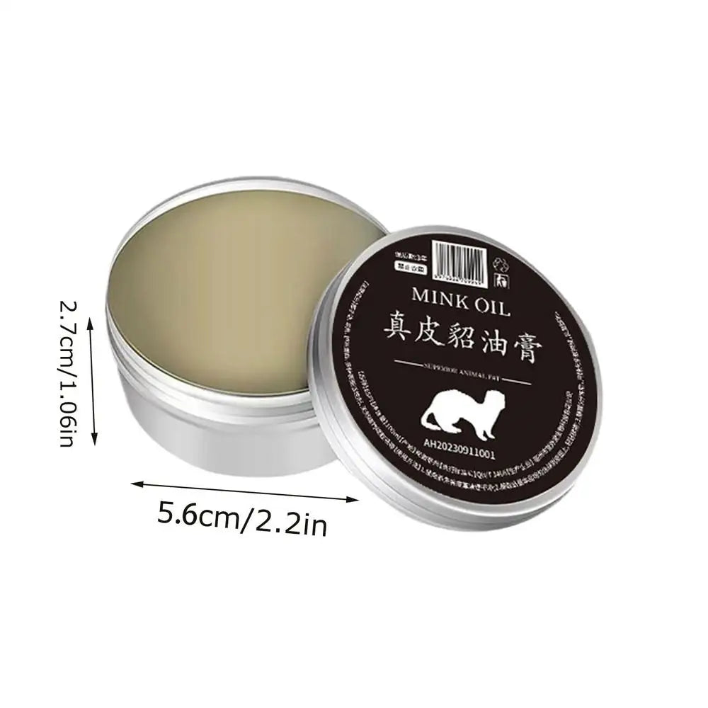 Mink oil cream in a round tin, ideal for maintaining and refurbishing leather products.