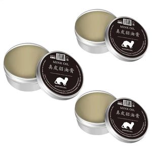 Mink oil cream in metal containers for leather care and maintenance, enhancing durability and shine.