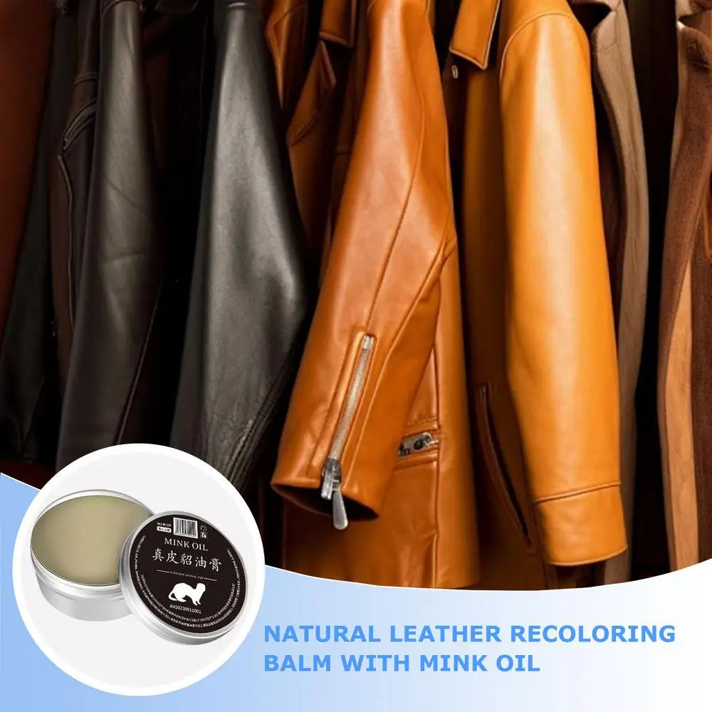 Natural leather recoloring balm with mink oil displayed alongside leather jackets for color restoration and care.